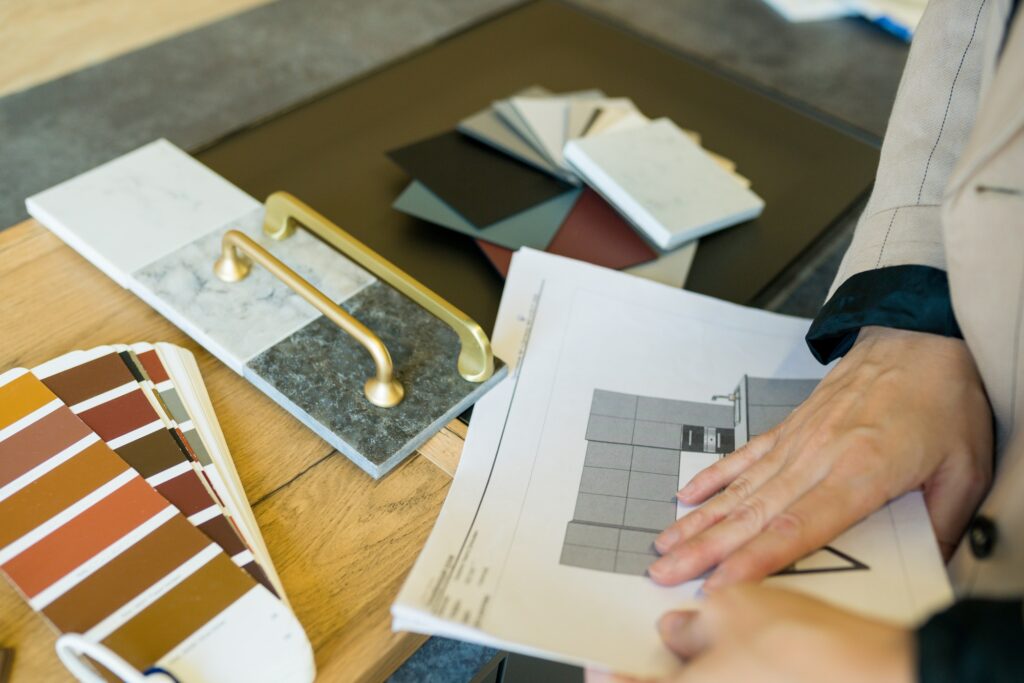 Designer woman choosing details of new kitchen in a home improvement store